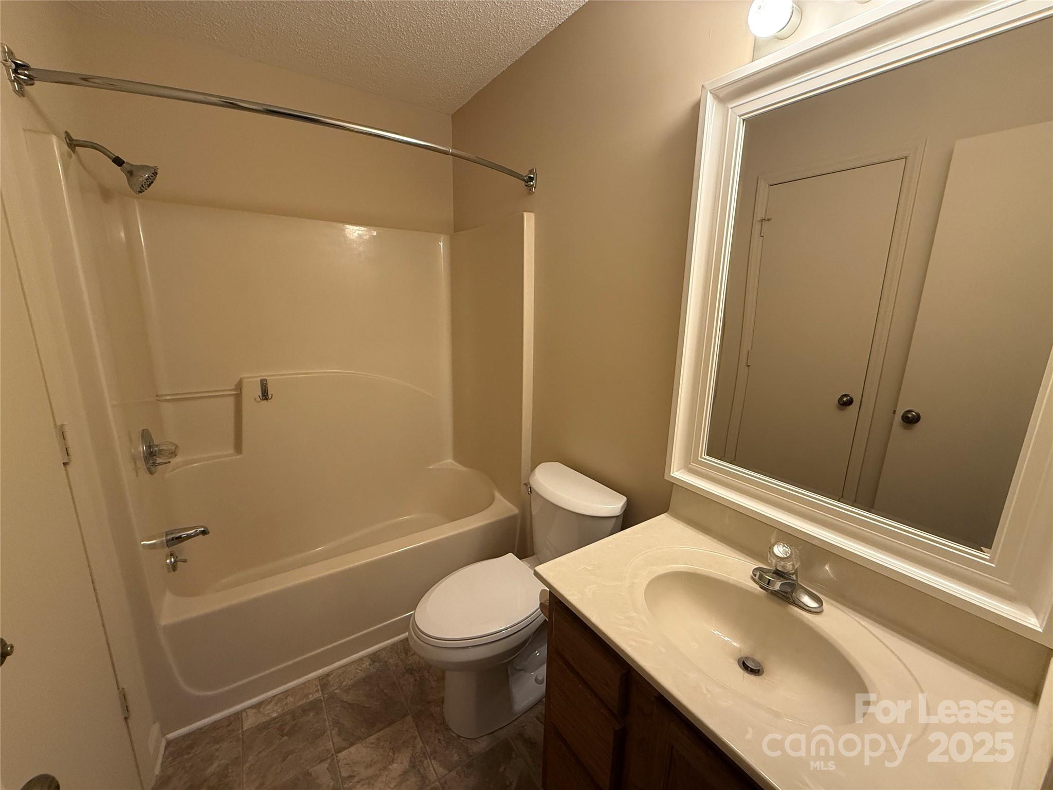 131 Pine Meadow Lane Mooresville, NC 28117 - Photo 14 of 20 a bathroom with a sink toilet and shower
