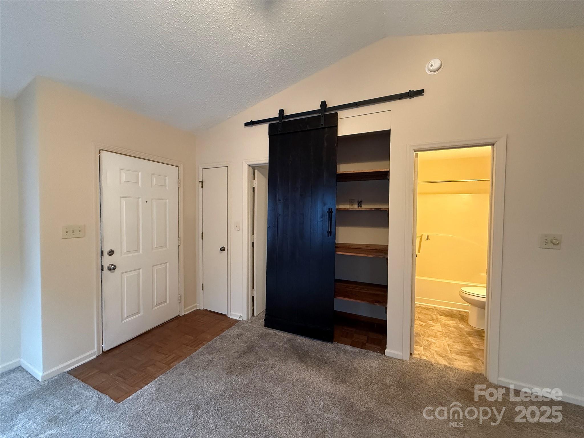131 Pine Meadow Lane Mooresville, NC 28117 - Photo 3 of 20 a view of an empty room with a closet