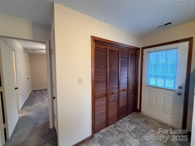 an empty room with closet