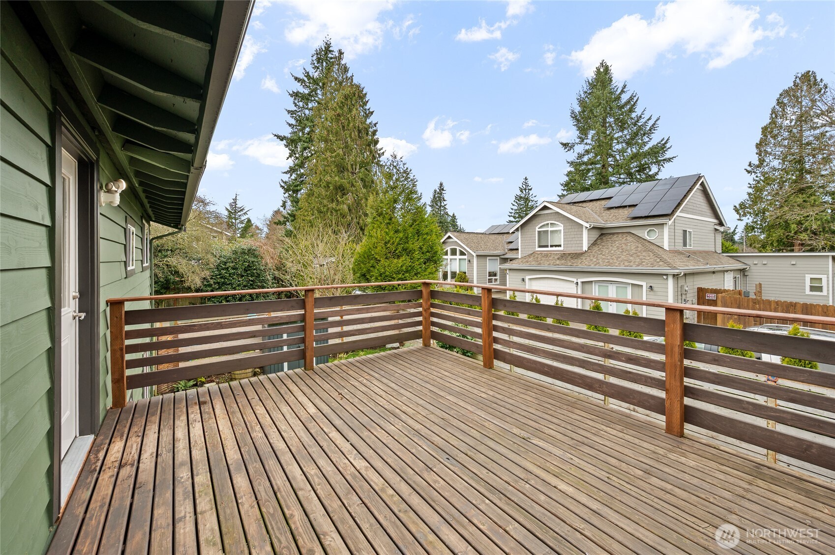 215 Hubbard Road Lynnwood, WA 98036 - Photo 14 of 30 a view of a street with wooden fence