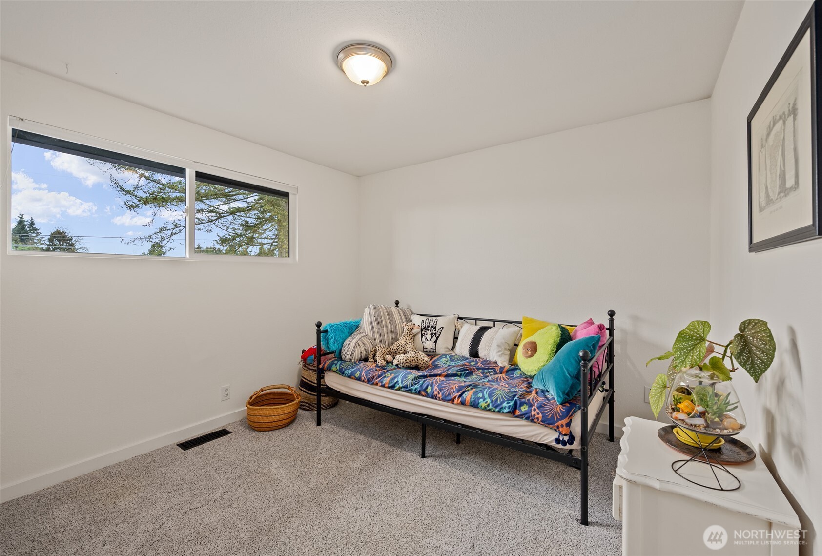 215 Hubbard Road Lynnwood, WA 98036 - Photo 16 of 30 a bedroom with a bed and a couch