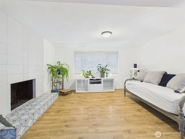 a room with furniture and a window