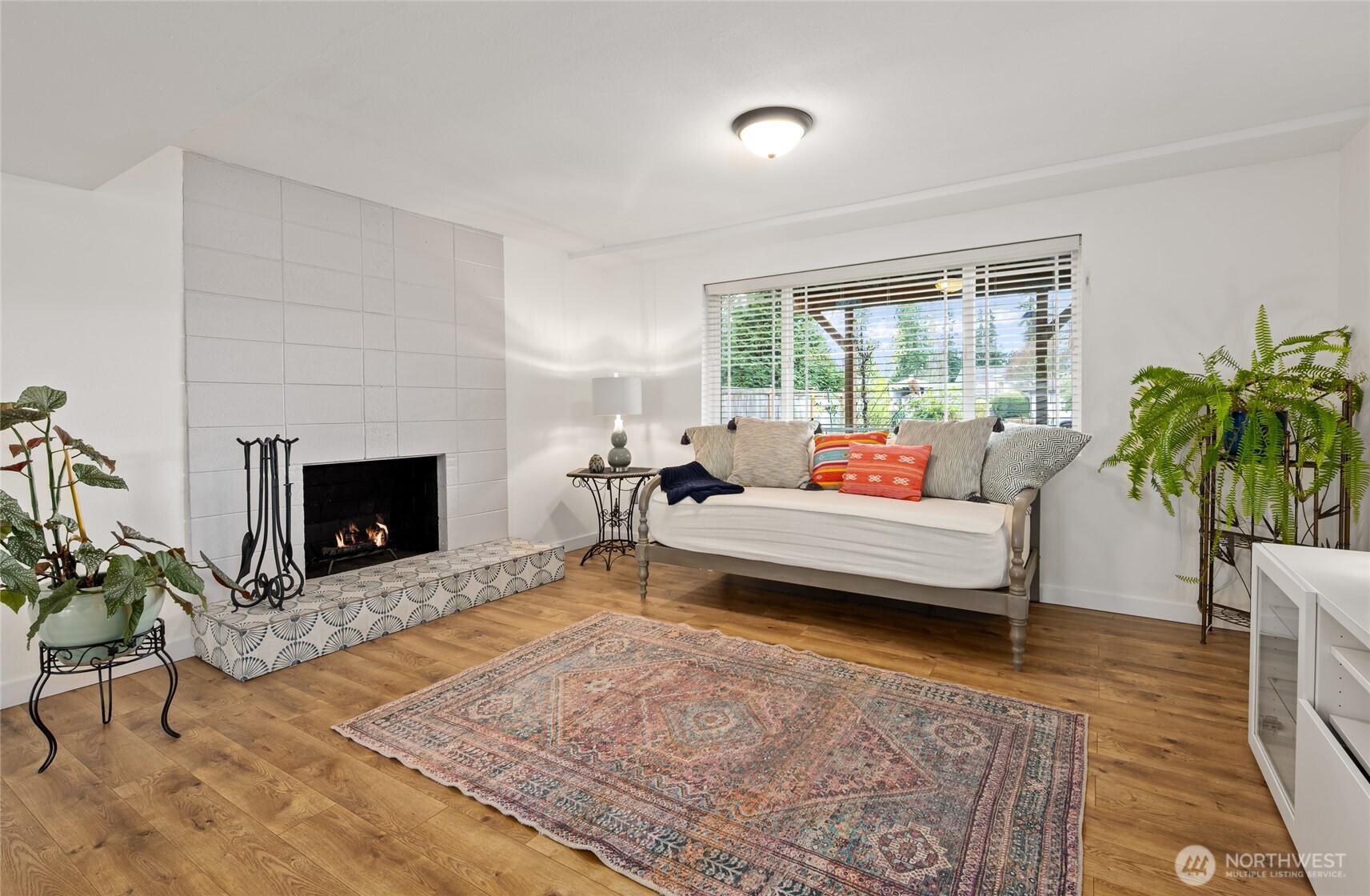 215 Hubbard Road Lynnwood, WA 98036 - Photo 22 of 30 a living room with furniture and a fireplace
