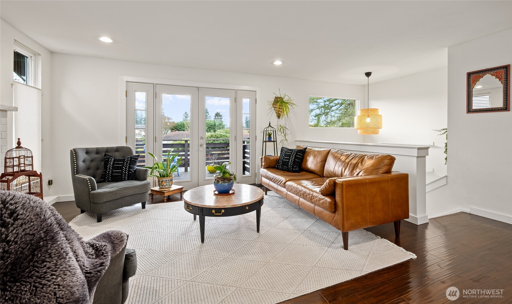 215 Hubbard Road Lynnwood, WA 98036 - Photo 4 of 30 a living room with furniture and a wooden floor
