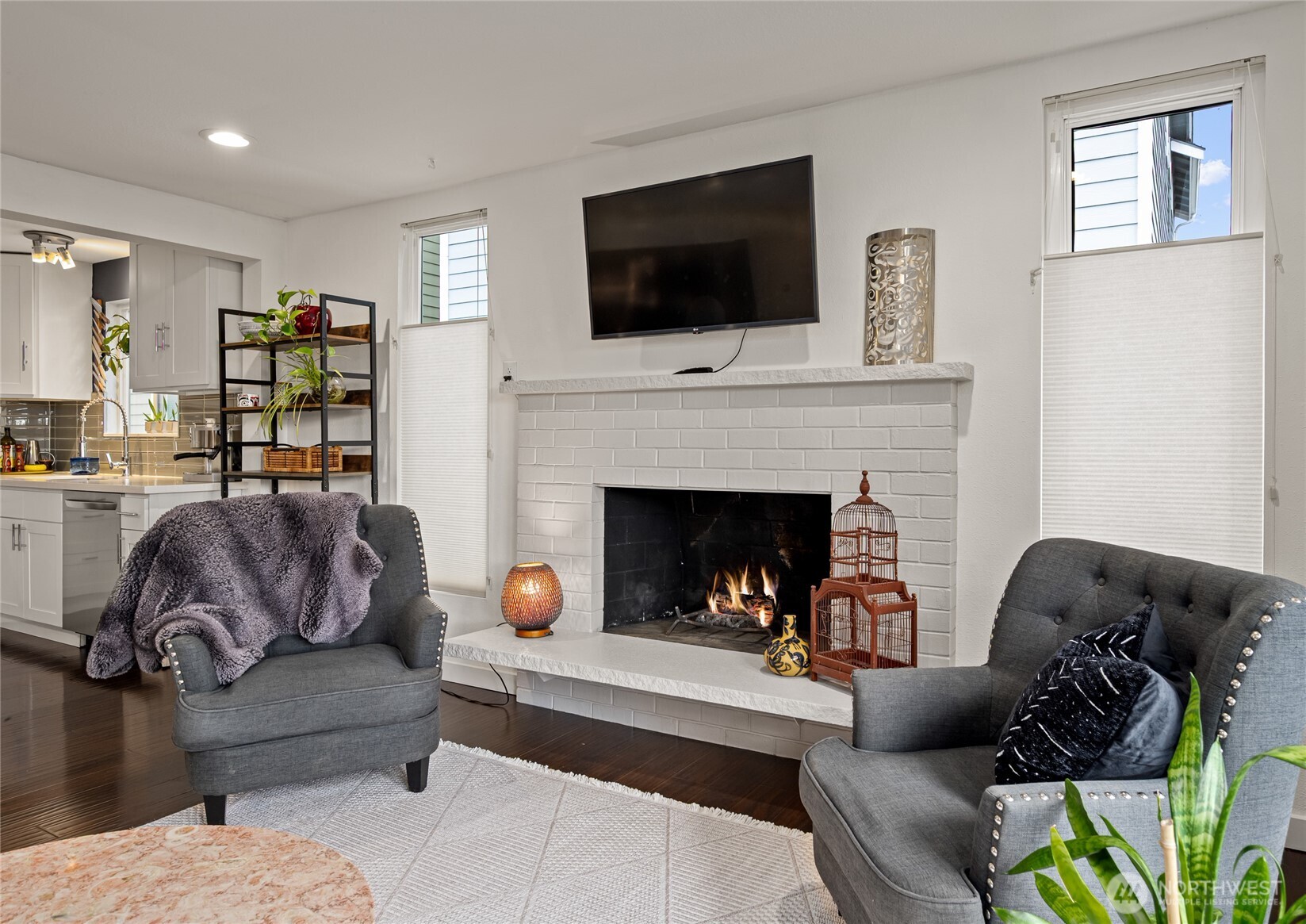 215 Hubbard Road Lynnwood, WA 98036 - Photo 6 of 30 a living room with furniture and a fireplace