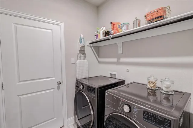 a view of a house with a yard patio and a slide
