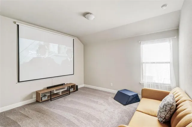 a bathroom with a double vanity sink toilet and shower