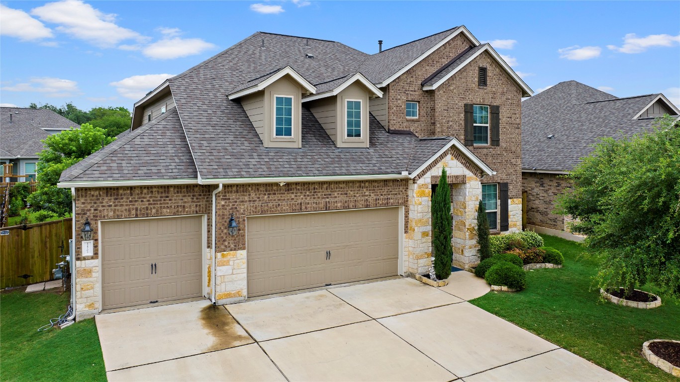 12705 Twisted Root Drive Manchaca, TX 78652 - Photo 1 of 1 a front view of a house with a yard