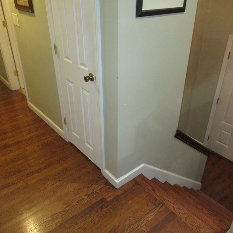 19 Haskell Road Pepperell, MA 01463 - Photo 16 of 40 a view of a hallway with wooden floor