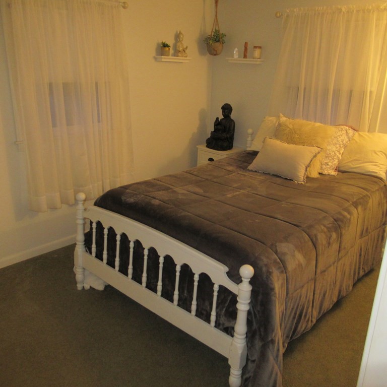 19 Haskell Road Pepperell, MA 01463 - Photo 18 of 40 a bedroom with a bed