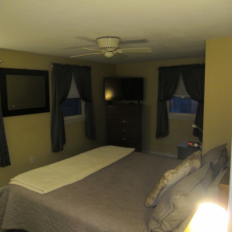 19 Haskell Road Pepperell, MA 01463 - Photo 20 of 40 a bedroom with a bed and a closet