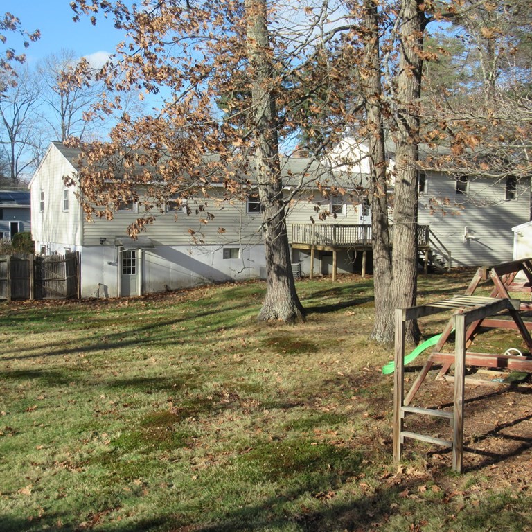 19 Haskell Road Pepperell, MA 01463 - Photo 7 of 40 a view of a yard in front of a house