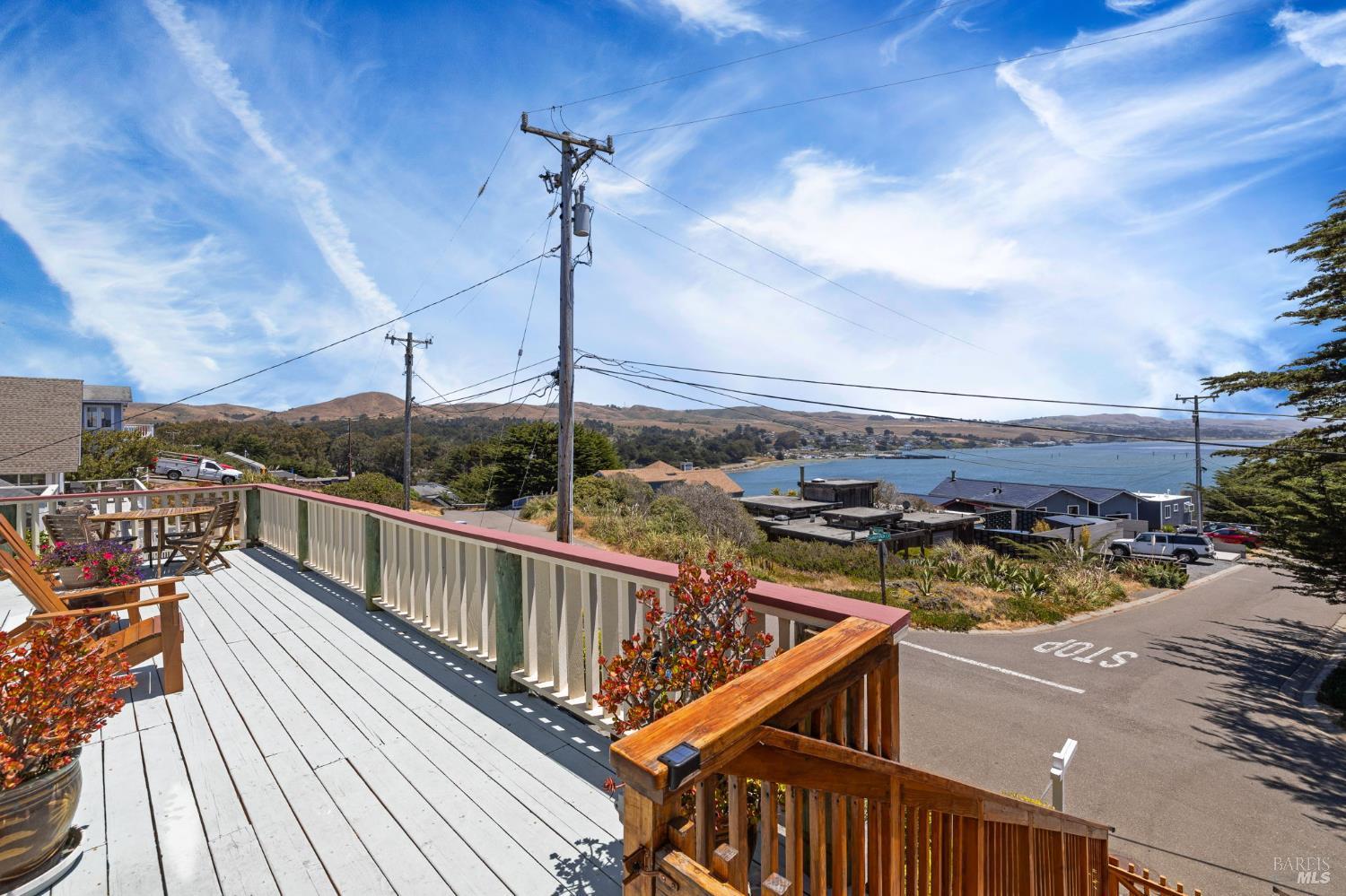1846 Whaleship Road Bodega Bay, CA 94923 - Photo 18 of 69 a view of a balcony with wooden floor and fence