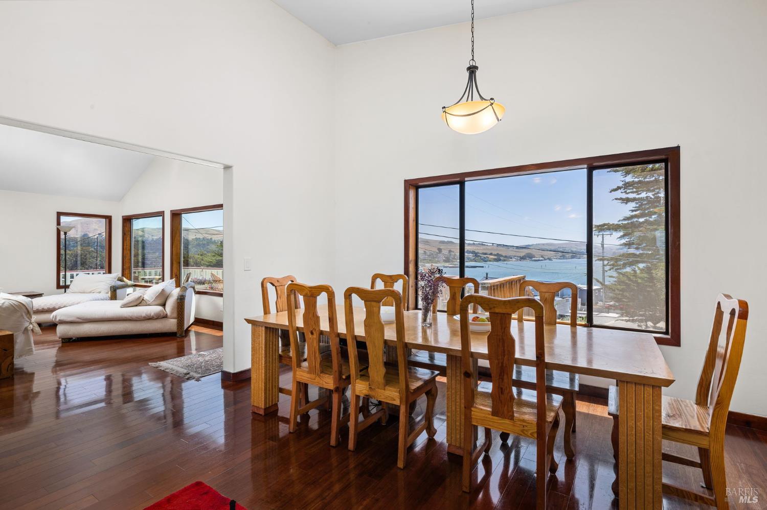1846 Whaleship Road Bodega Bay, CA 94923 - Photo 31 of 69 a view of a dining room with furniture window and wooden floor