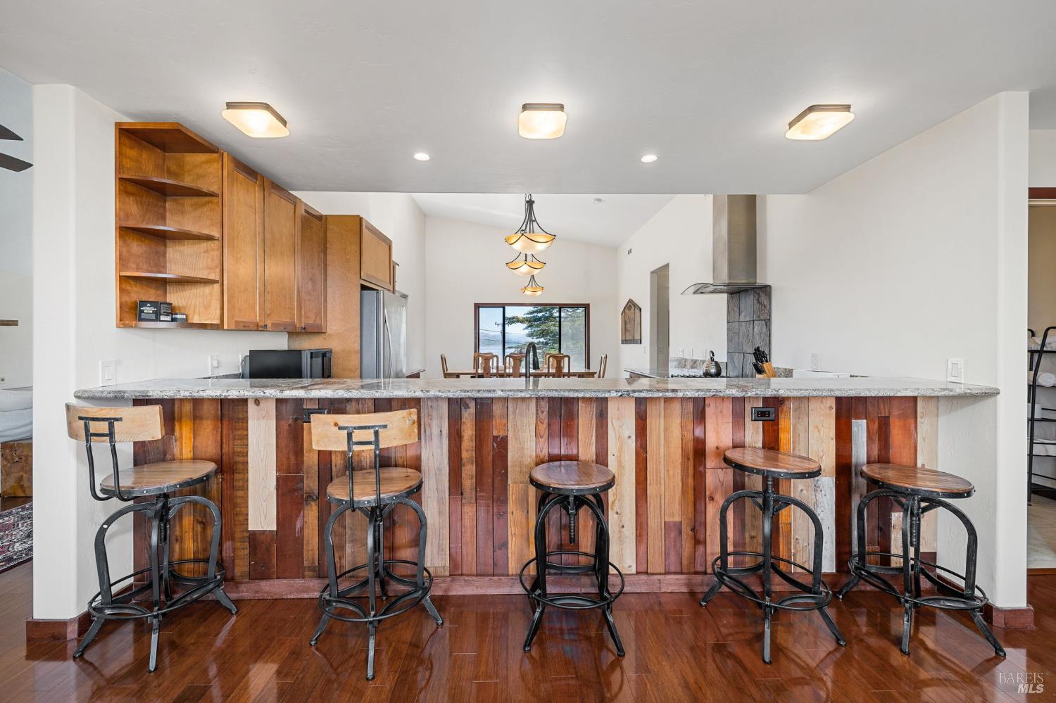 1846 Whaleship Road Bodega Bay, CA 94923 - Photo 39 of 69 a view of a kitchen with dining room and wooden floor