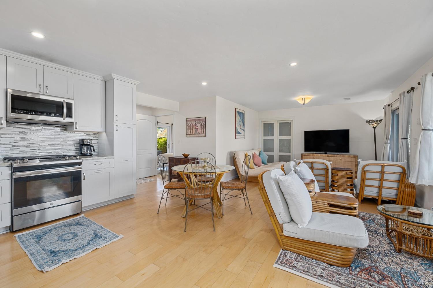 1846 Whaleship Road Bodega Bay, CA 94923 - Photo 43 of 69 a living room with furniture a flat screen tv and a fireplace