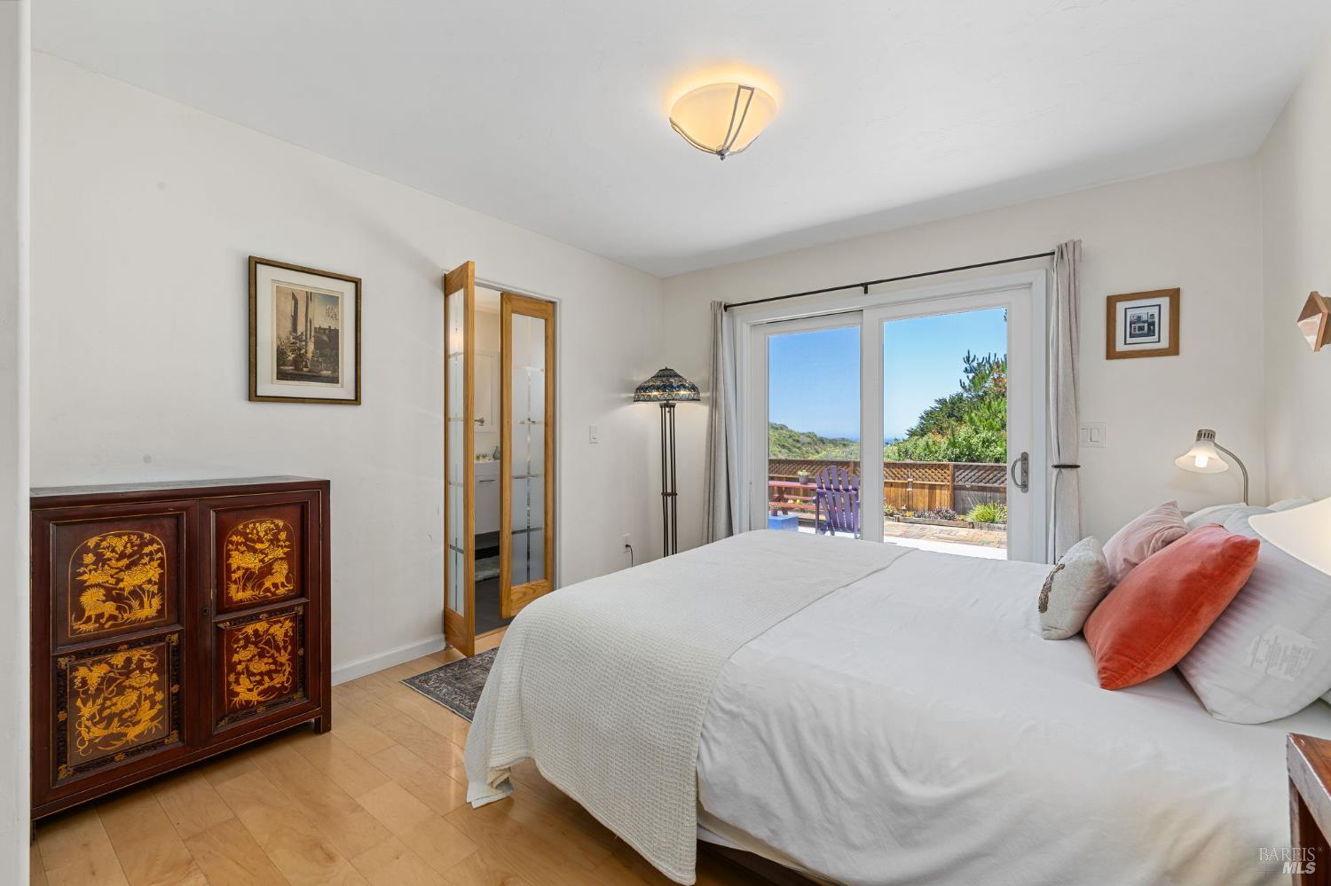 1846 Whaleship Road Bodega Bay, CA 94923 - Photo 49 of 69 a bedroom with a bed and a window