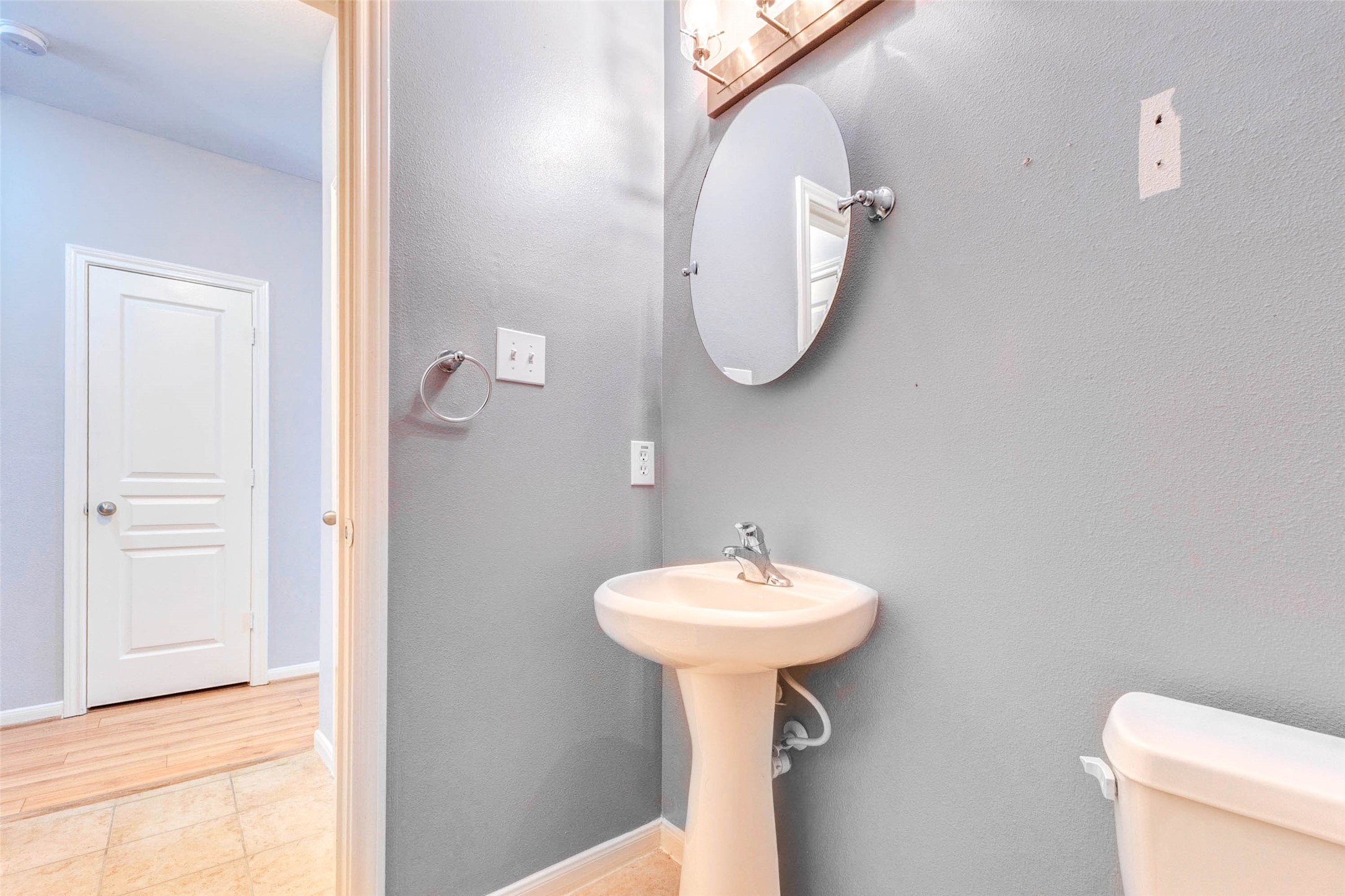 14522 Durham Chase Lane Houston, TX 77095 - Photo 6 of 40 a bathroom with a sink a mirror and toilet