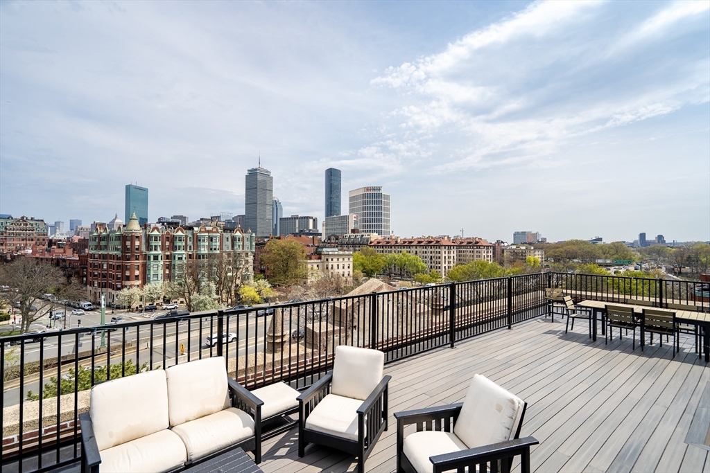 60 Charlesgate West, Unit BA Boston, MA 02215 - Photo 1 of 37 a view of a chairs and table on the roof deck