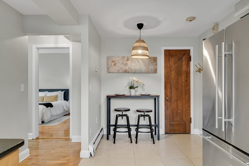 60 Charlesgate West, Unit BA Boston, MA 02215 - Photo 20 of 37 a view of room with furniture and wooden floor