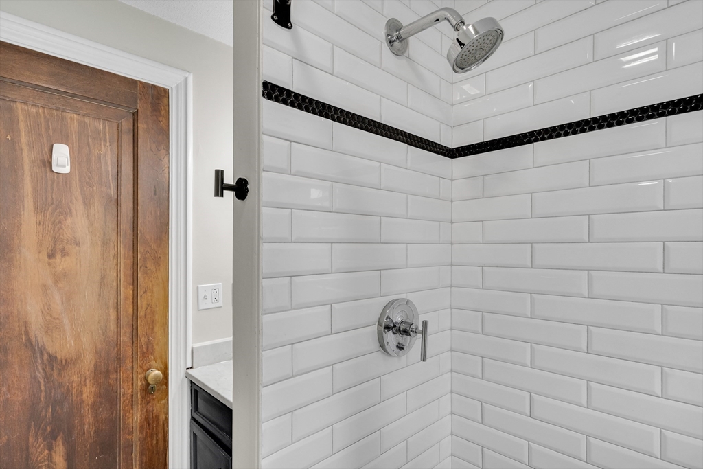 60 Charlesgate West, Unit BA Boston, MA 02215 - Photo 30 of 37 a bathroom with a shower