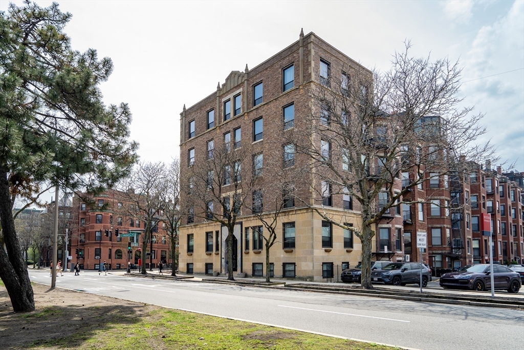 60 Charlesgate West, Unit BA Boston, MA 02215 - Photo 34 of 37 a large building with a street sign on it