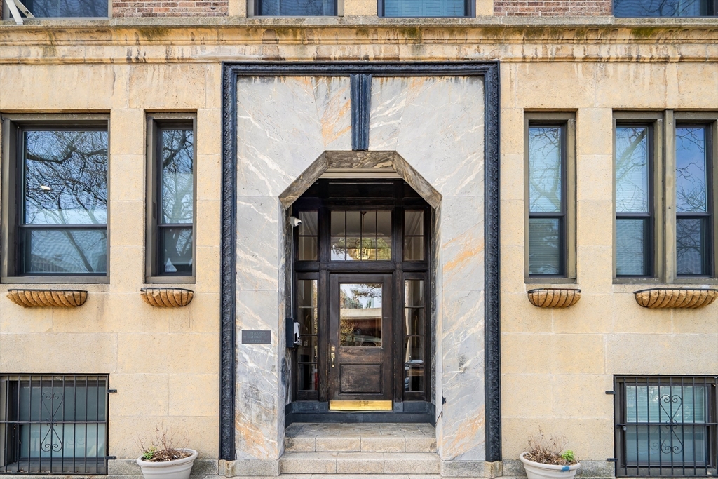 60 Charlesgate West, Unit BA Boston, MA 02215 - Photo 36 of 37 a front view of a house with glass windows
