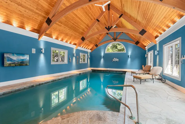 a view of a chairs and a table in the patio