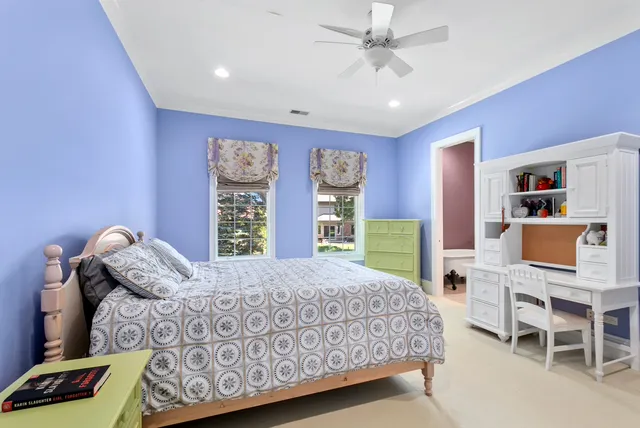 a bedroom with a bed and a cabinets