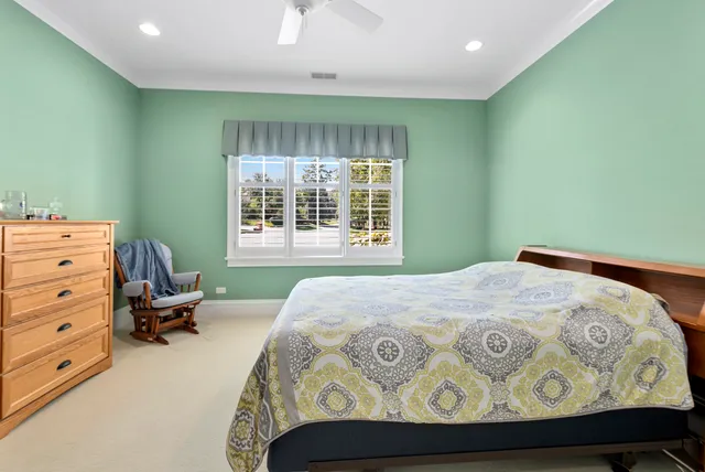 a bedroom with a bed and furniture