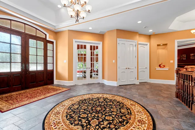 a living room with a rug