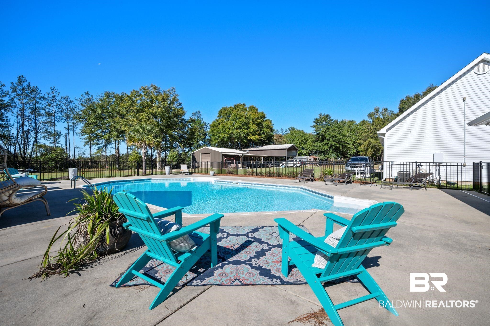 38211-d) V R Byrd Road Bay Minette, AL 36507 - Photo 32 of 58 View of swimming pool with a patio