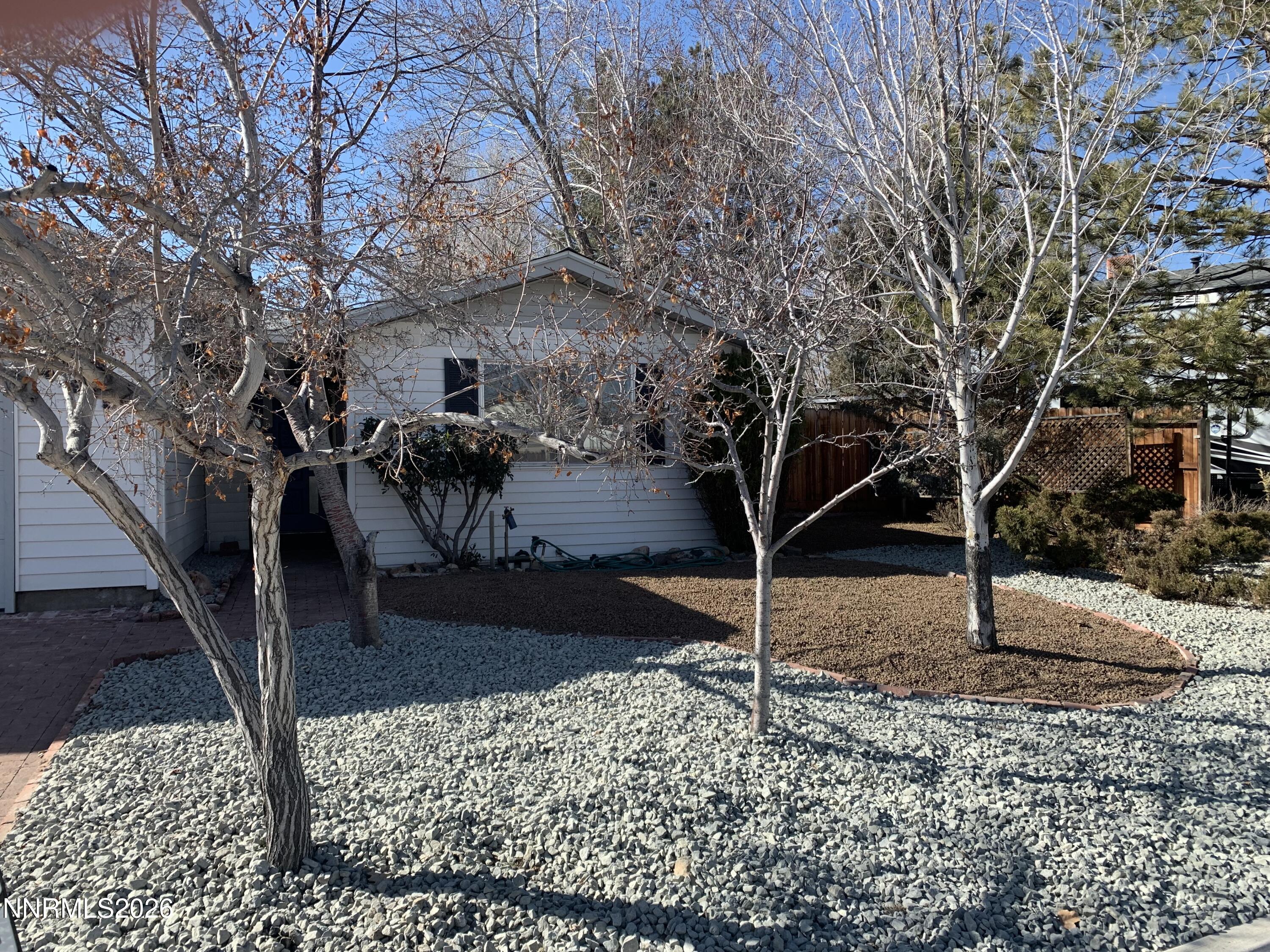 995 Sage View Drive Sparks, NV 89434 - Photo 12 of 13 a view of a house with a yard