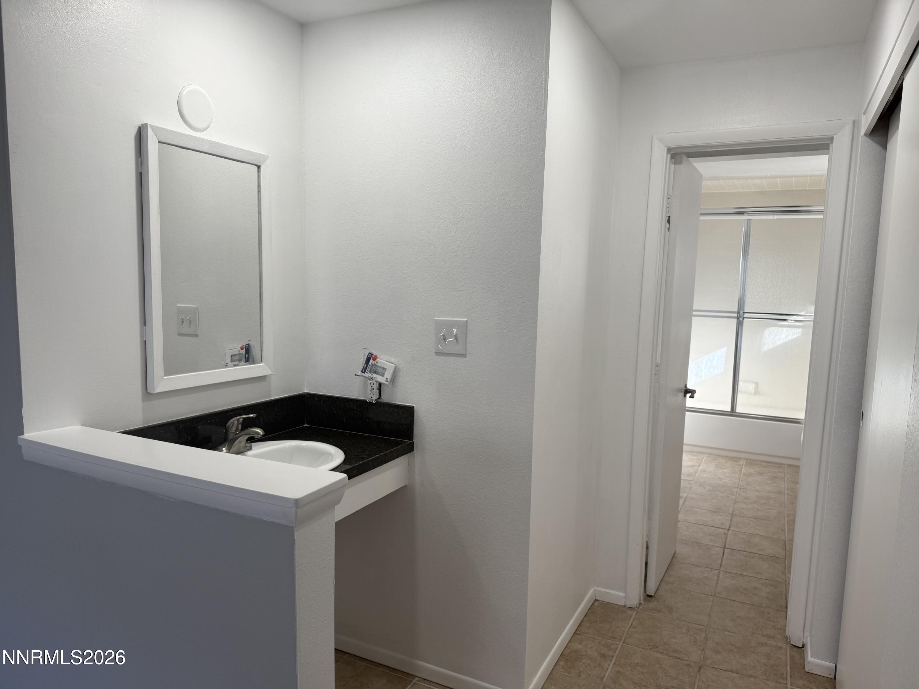 995 Sage View Drive Sparks, NV 89434 - Photo 7 of 13 a room with a table and mirror