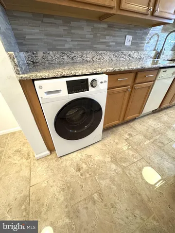 a utility room with a sink