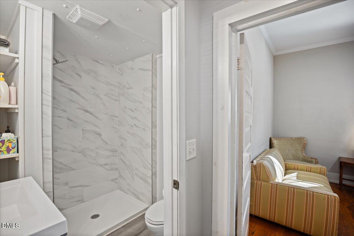 123 Kerr Drive Roxboro, NC 27573 - Photo 20 of 33 a bathroom with a bathtub and a shower