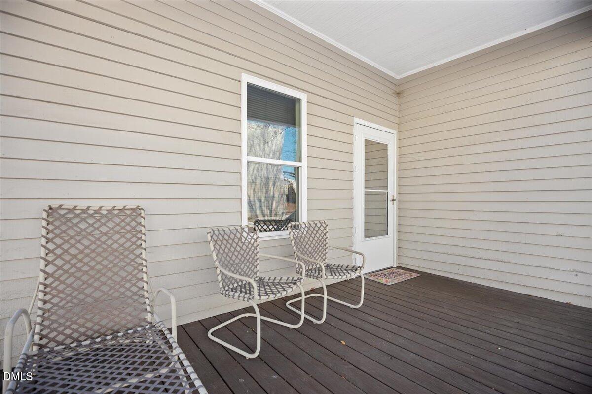 123 Kerr Drive Roxboro, NC 27573 - Photo 32 of 33 a view of a room with a table and chairs