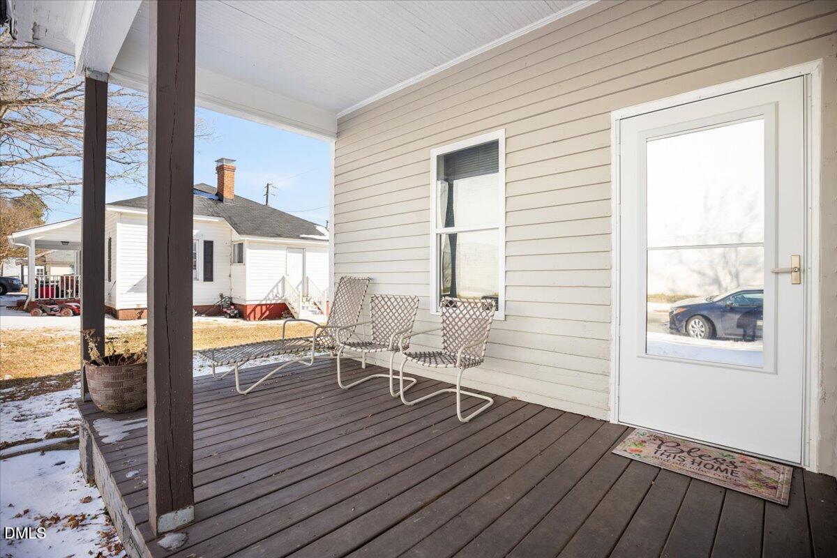 123 Kerr Drive Roxboro, NC 27573 - Photo 4 of 33 a view of a living room and dining room with wooden floor