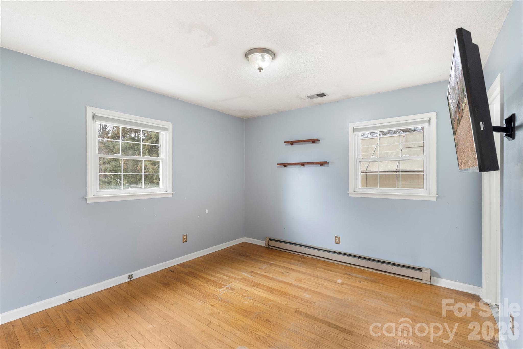 1152 Faulkner Road Clover, SC 29710 - Photo 16 of 39 a view of a room with blue walls and a window