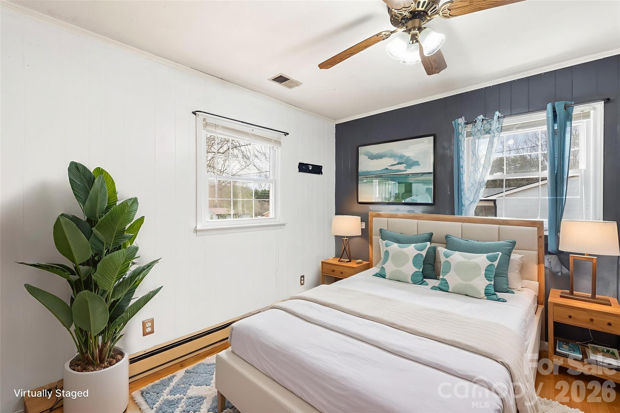 1152 Faulkner Road Clover, SC 29710 - Photo 20 of 39 a bedroom with furniture and a potted plant