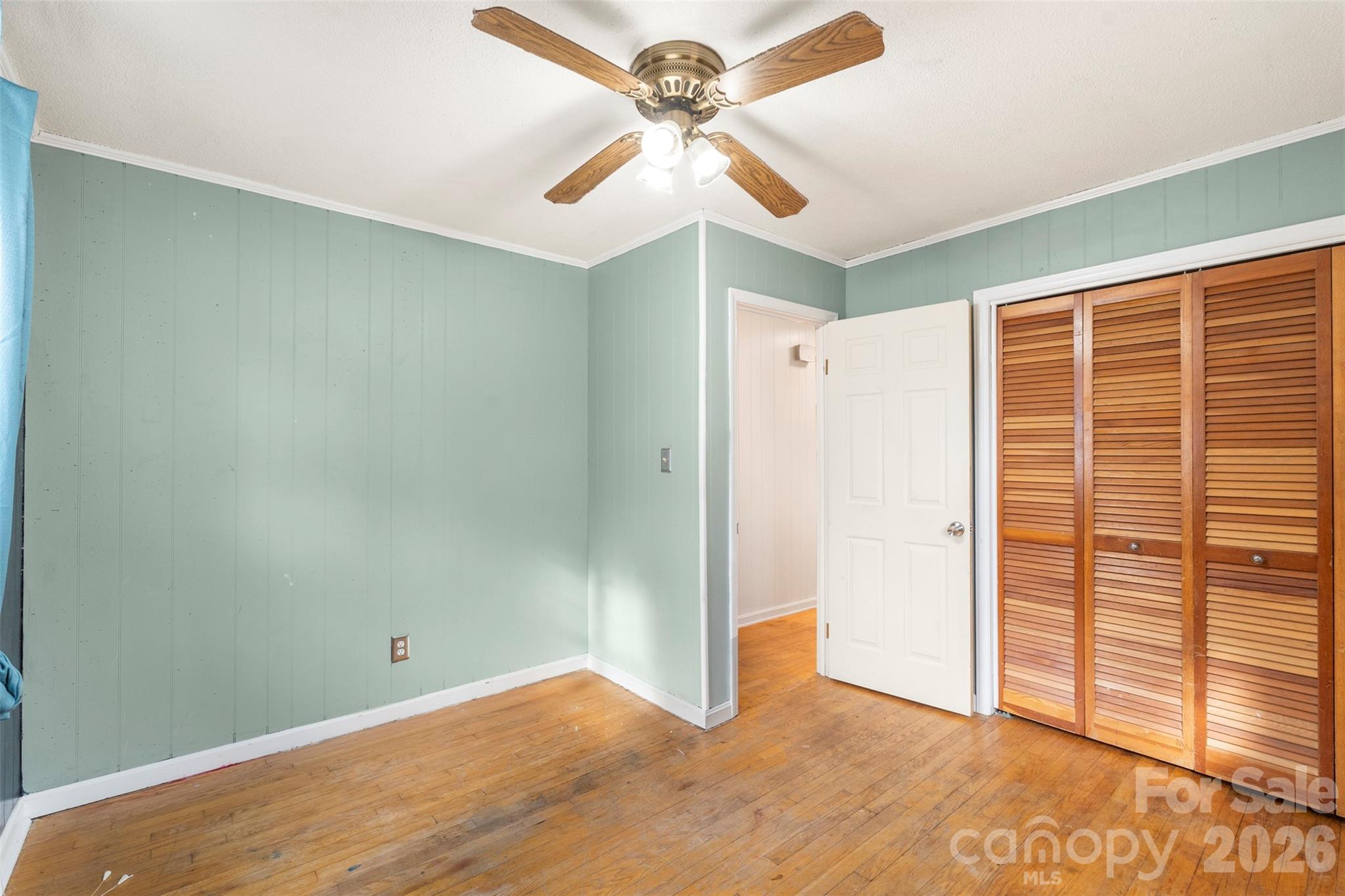 1152 Faulkner Road Clover, SC 29710 - Photo 22 of 39 an empty room with windows and fan