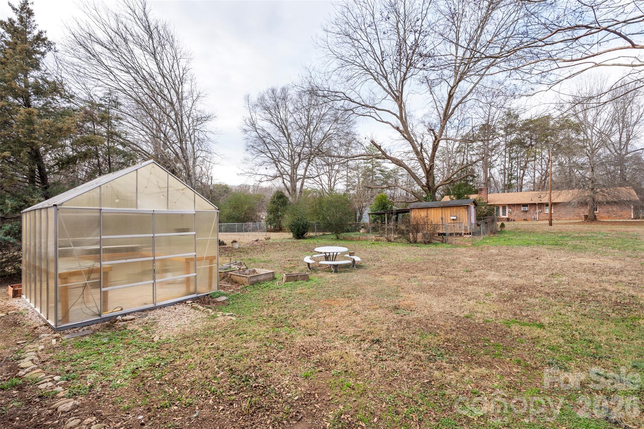 1152 Faulkner Road Clover, SC 29710 - Photo 28 of 39 a view of a house with a yard and garage