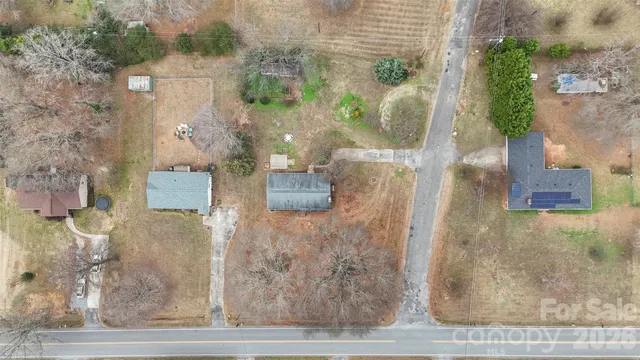 a brick building with a yard