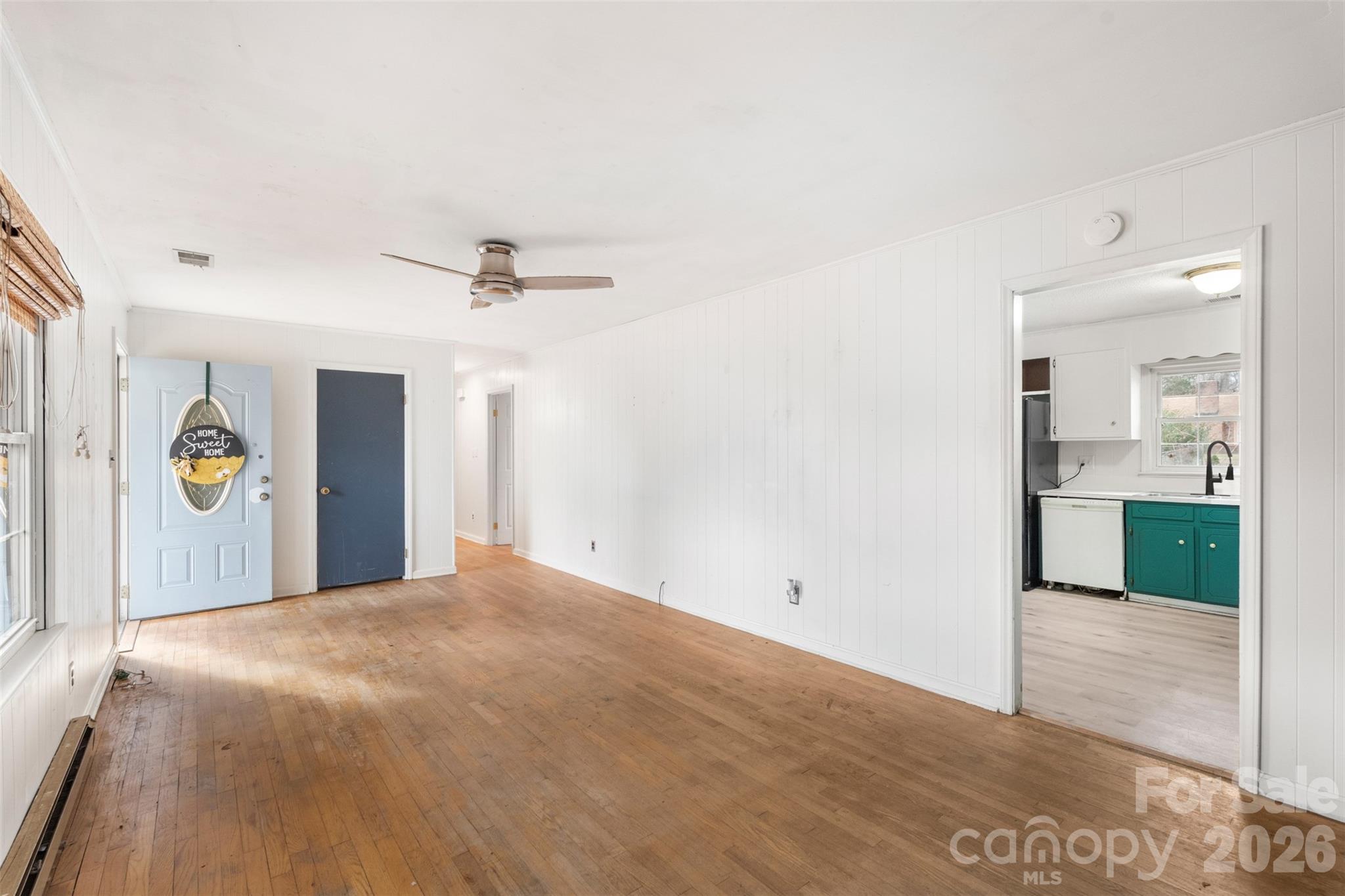 1152 Faulkner Road Clover, SC 29710 - Photo 8 of 39 a view of a big room with windows and cabinet
