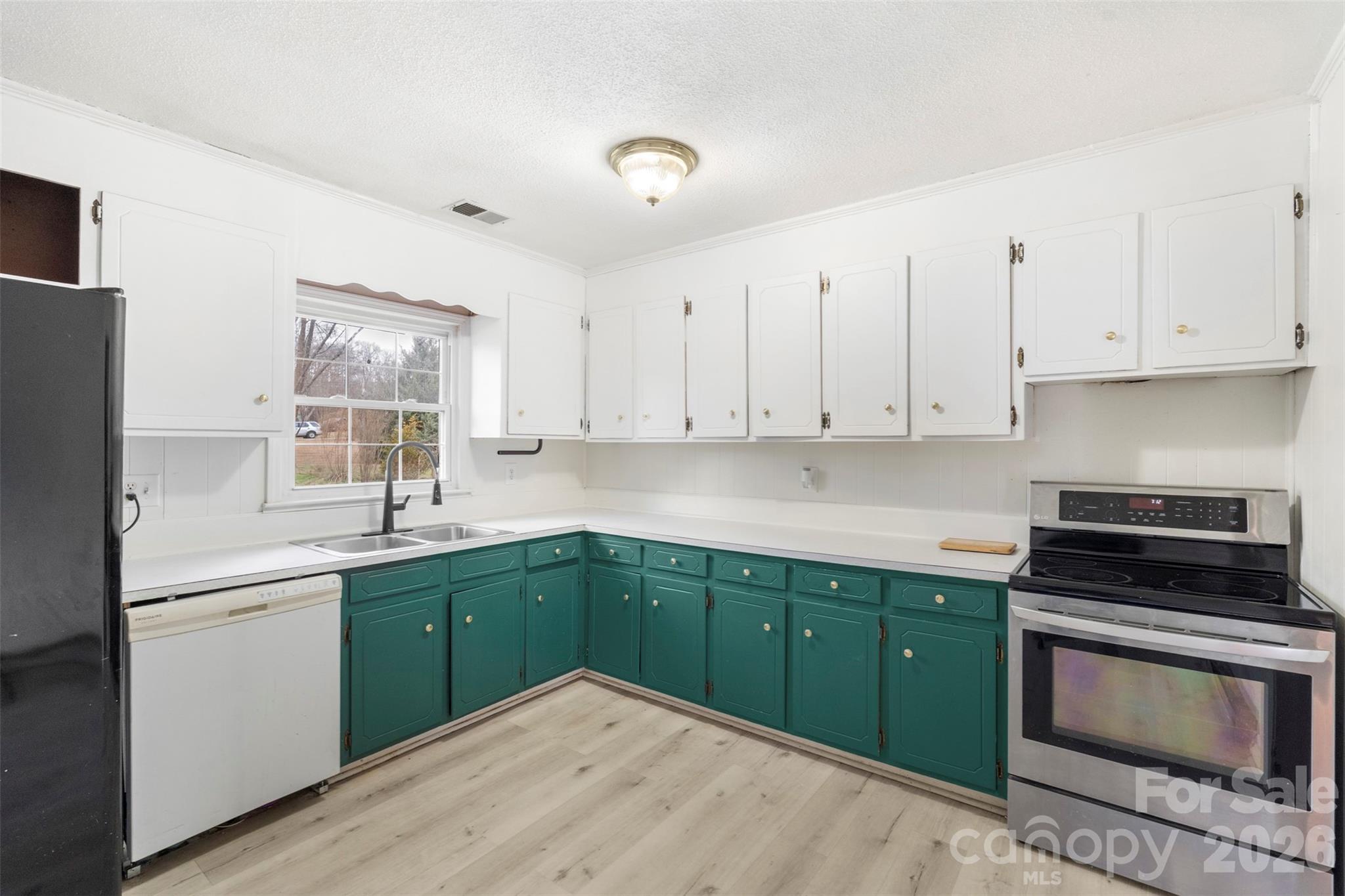 1152 Faulkner Road Clover, SC 29710 - Photo 10 of 39 a kitchen with sink and cabinets