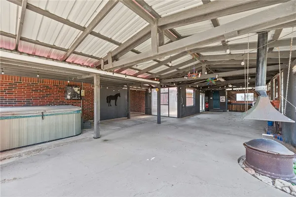 a view of a room with wooden walls