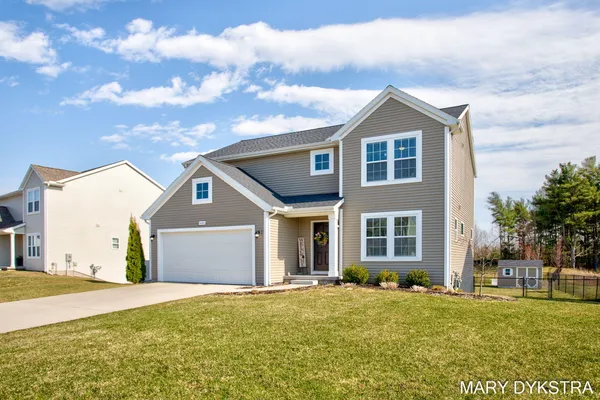 $450,000 | 14482 Tupelo Drive, West Olive, MI 49460