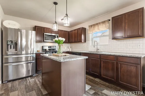 $450,000 | 14482 Tupelo Drive, West Olive, MI 49460