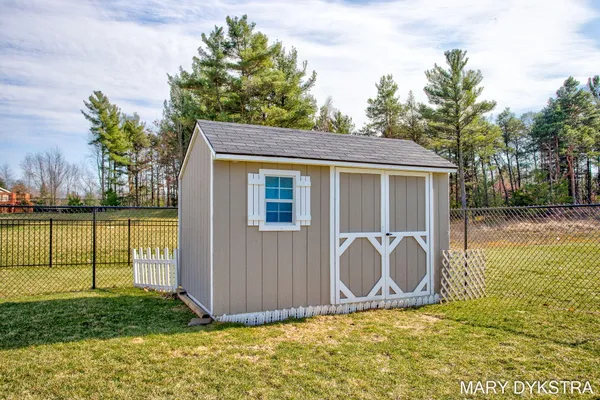 $450,000 | 14482 Tupelo Drive, West Olive, MI 49460