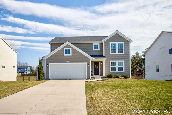 $450,000 | 14482 Tupelo Drive, West Olive, MI 49460